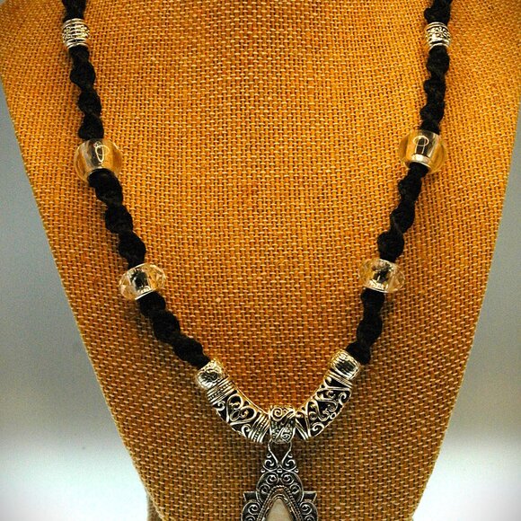 Elegant Opalescence Teardrop Cabochon on a 20" Handmade Black Hemp Necklace - Picture 3 of 7